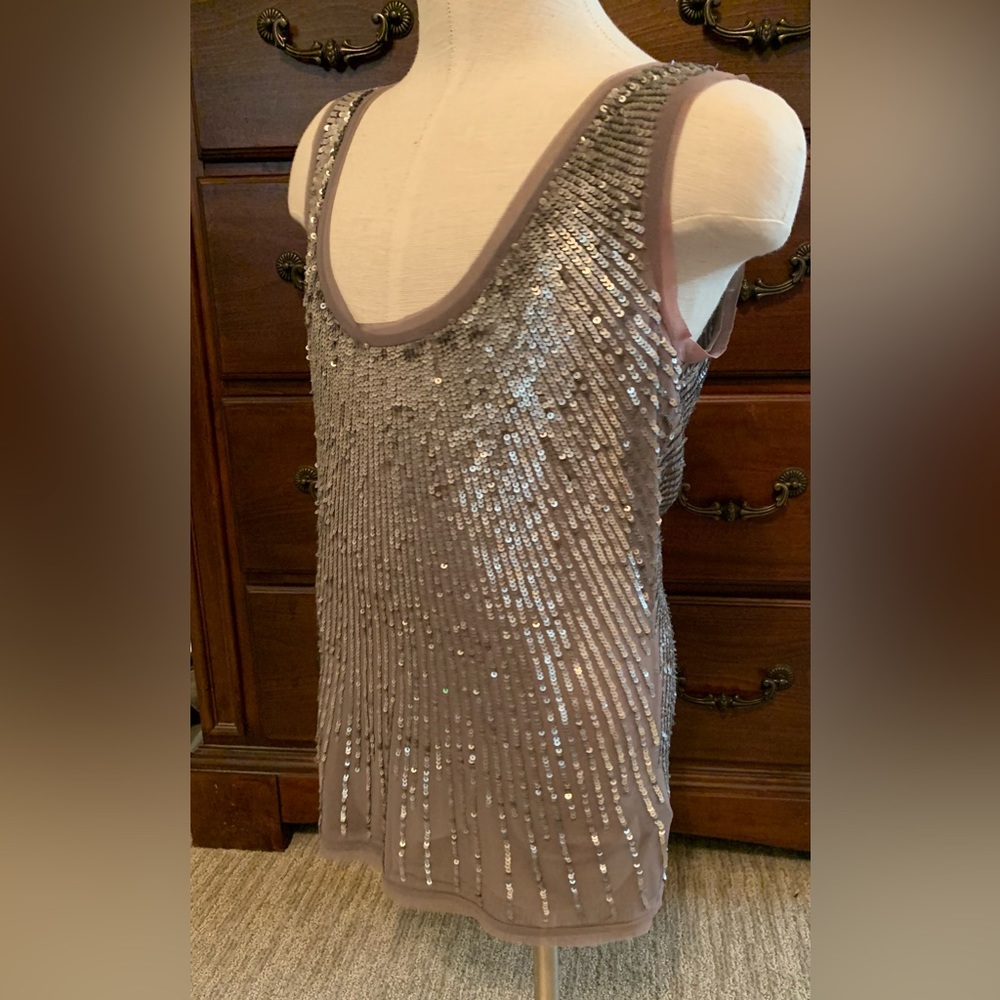 Silver sequins tank. Very  festive Comfortable fit.